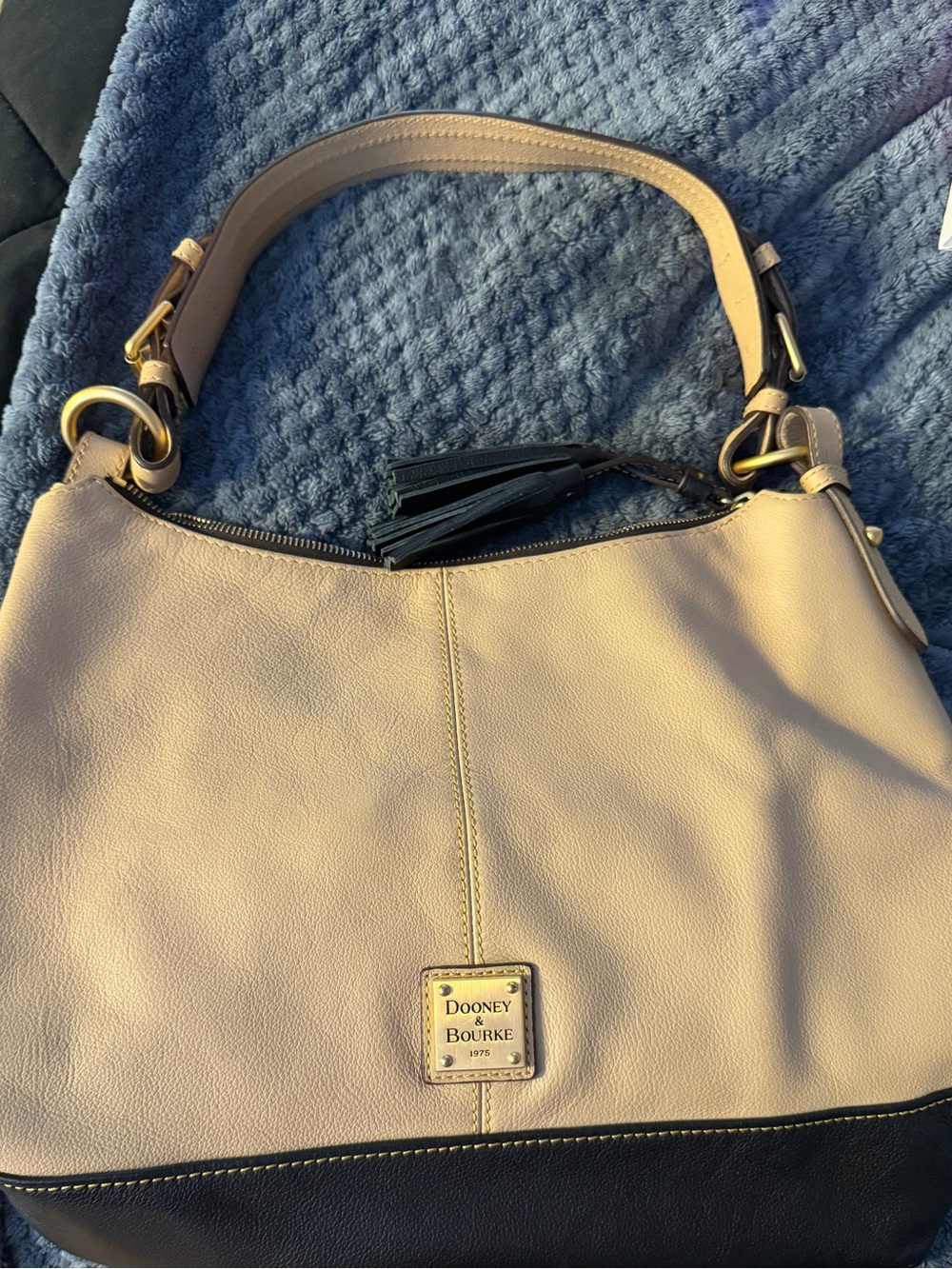 Dooney & Bourke Beige and Black Leather Shoulder Hobo with Tassel